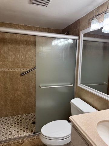 712 Sunny Pine Way, Greenacres, FL 33415