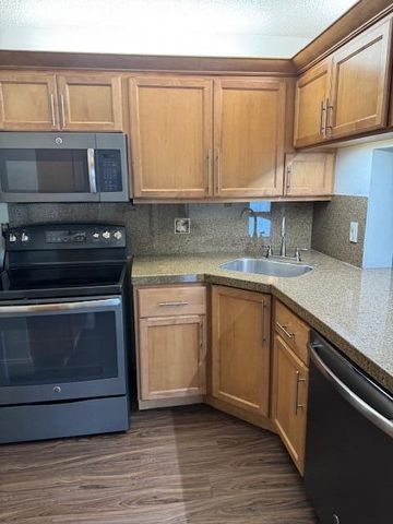 712 Sunny Pine Way, Greenacres, FL 33415