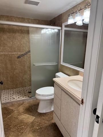 712 Sunny Pine Way, Greenacres, FL 33415