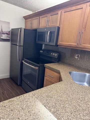 712 Sunny Pine Way, Greenacres, FL 33415