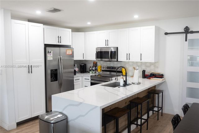 7330 NW 1st Court, Pembroke Pines, FL 33024