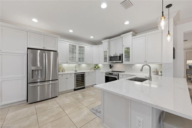 3306 Baltic DR, Naples, FL 34119