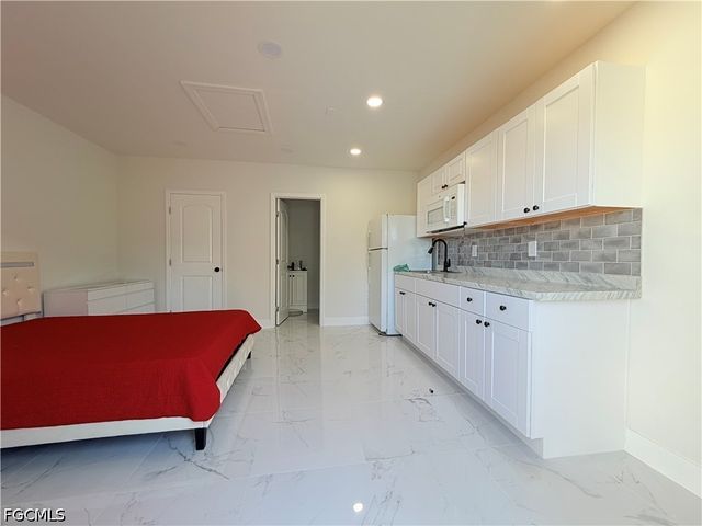 100 NW 13th PL, Cape Coral, FL 33993