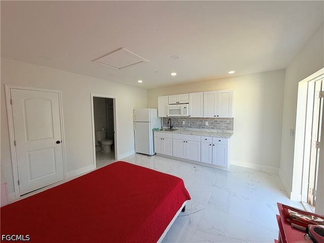 100 NW 13th PL, Cape Coral, FL 33993