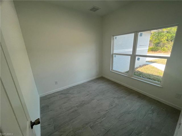 3013 64th ST W, Lehigh Acres, FL 33971