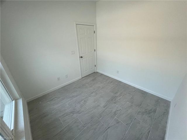 3013 64th ST W, Lehigh Acres, FL 33971