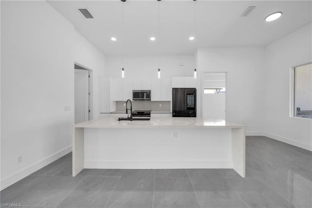 2720 NW 41st AVE, Cape Coral, FL 33993