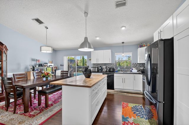 7625 Woodland Creek Lane, Lake Worth, FL 33467