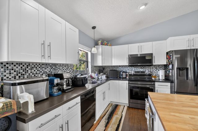 7625 Woodland Creek Lane, Lake Worth, FL 33467