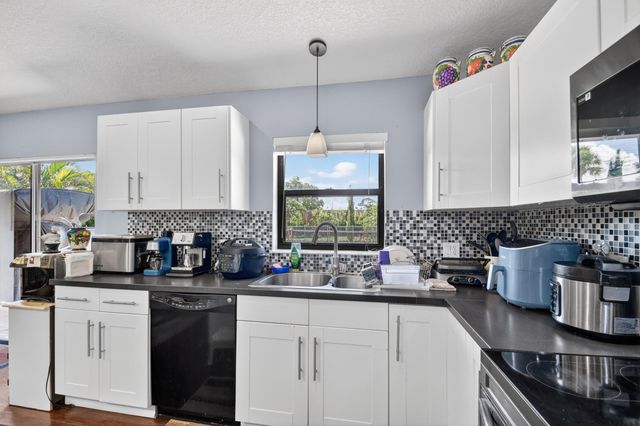 7625 Woodland Creek Lane, Lake Worth, FL 33467