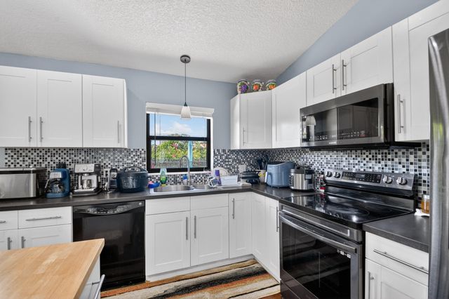 7625 Woodland Creek Lane, Lake Worth, FL 33467
