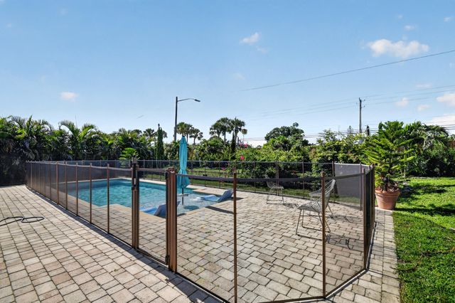 7625 Woodland Creek Lane, Lake Worth, FL 33467