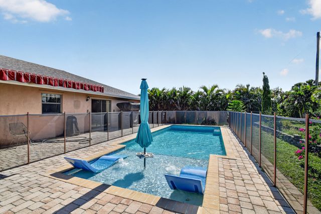 7625 Woodland Creek Lane, Lake Worth, FL 33467