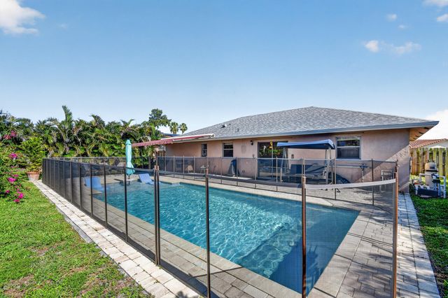 7625 Woodland Creek Lane, Lake Worth, FL 33467