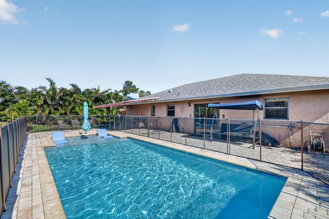 7625 Woodland Creek Lane, Lake Worth, FL 33467