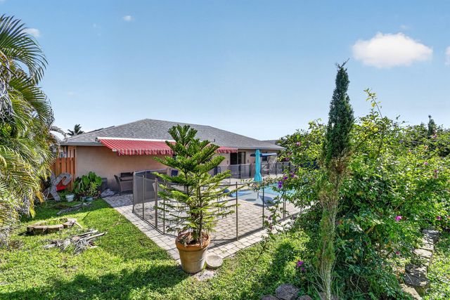 7625 Woodland Creek Lane, Lake Worth, FL 33467