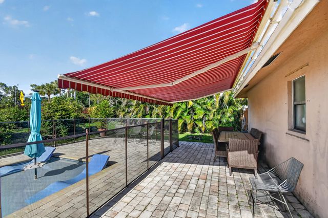 7625 Woodland Creek Lane, Lake Worth, FL 33467