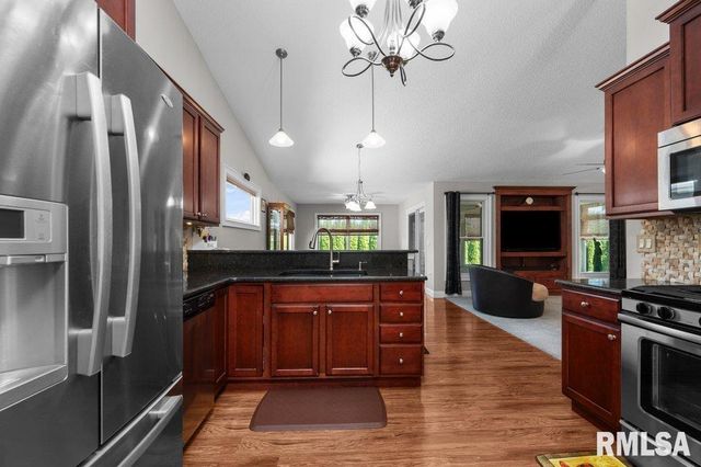 423 KEVIN Road, Blue Grass, IA 52726