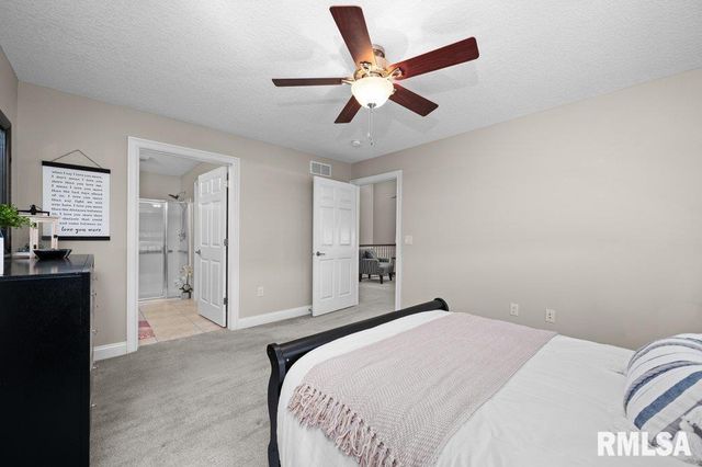 423 KEVIN Road, Blue Grass, IA 52726