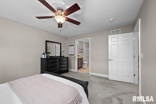 423 KEVIN Road, Blue Grass, IA 52726