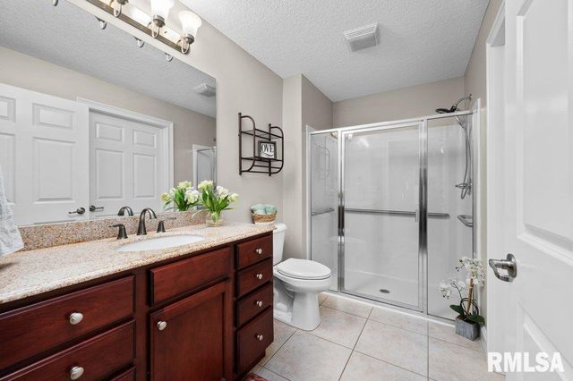 423 KEVIN Road, Blue Grass, IA 52726