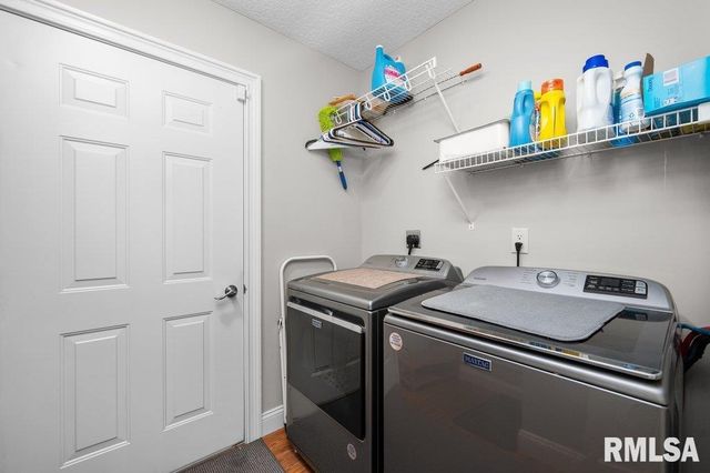 423 KEVIN Road, Blue Grass, IA 52726