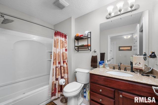 423 KEVIN Road, Blue Grass, IA 52726