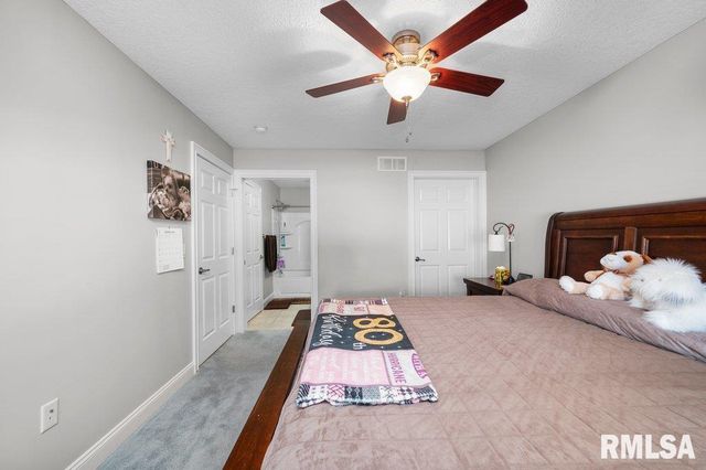 423 KEVIN Road, Blue Grass, IA 52726