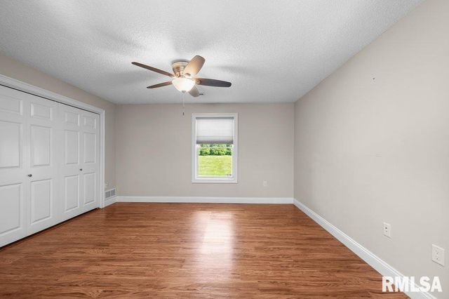 423 KEVIN Road, Blue Grass, IA 52726