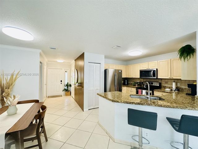 8952 NW 38th Dr., Coral Springs, FL 33065