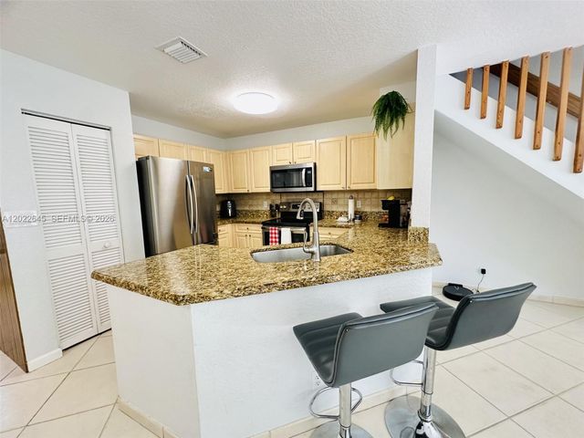 8952 NW 38th Dr., Coral Springs, FL 33065