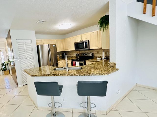 8952 NW 38th Dr., Coral Springs, FL 33065