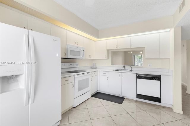13705 SW 12th Street 208B, Pembroke Pines, FL 33027