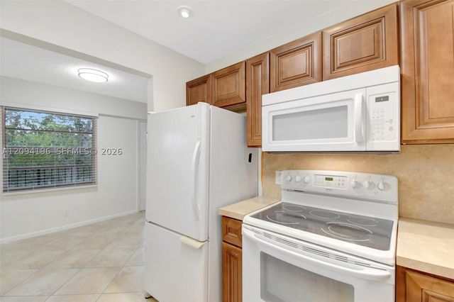 13475 SW 9th St 413A, Pembroke Pines, FL 33027