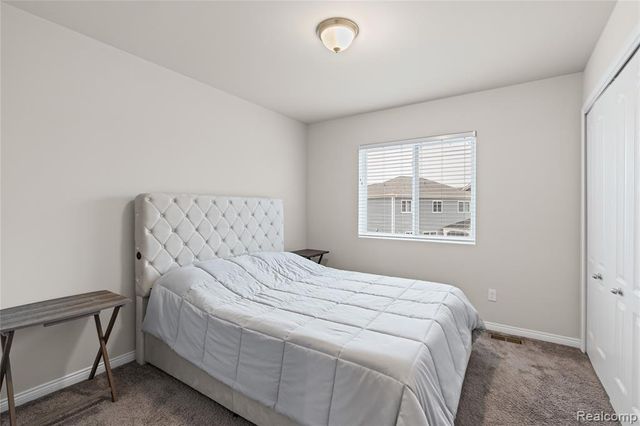 320 Hidden River E, Holly, MI 48442