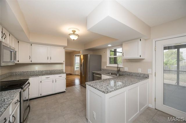 3042 Winding River Drive, St Charles, MO 63303