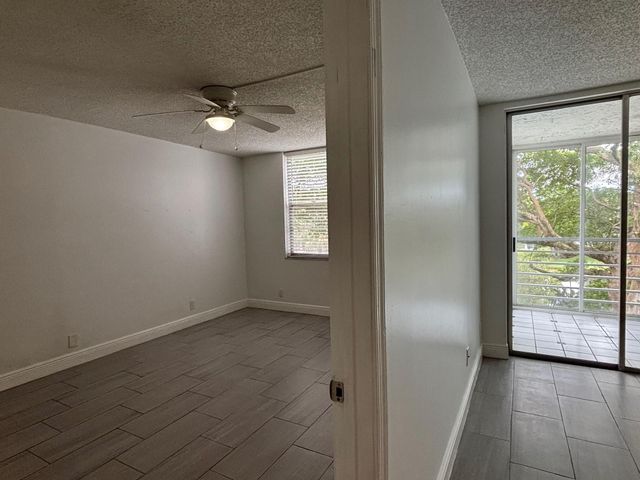 9325 Lagoon Place, Davie, FL 33324