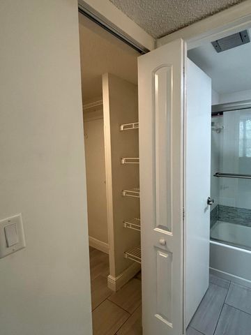9325 Lagoon Place, Davie, FL 33324