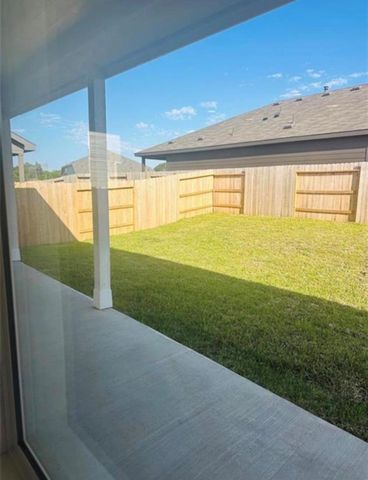 226 Draper Shadows Drive, Willis, TX 77378