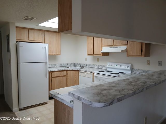 1649 Sunny Brook Lane NE B103, Palm Bay, FL 32905