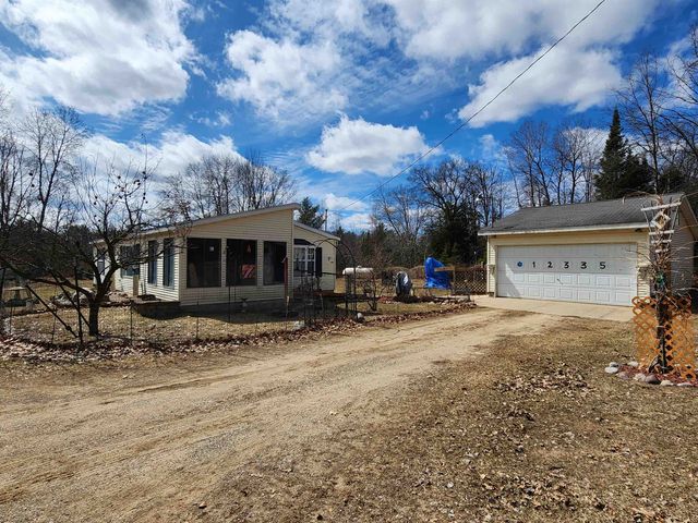 12335 Clareola Avenue, Marion, MI 49665