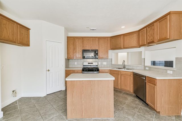 7 Heron Hollow Court, The Woodlands, TX 77382