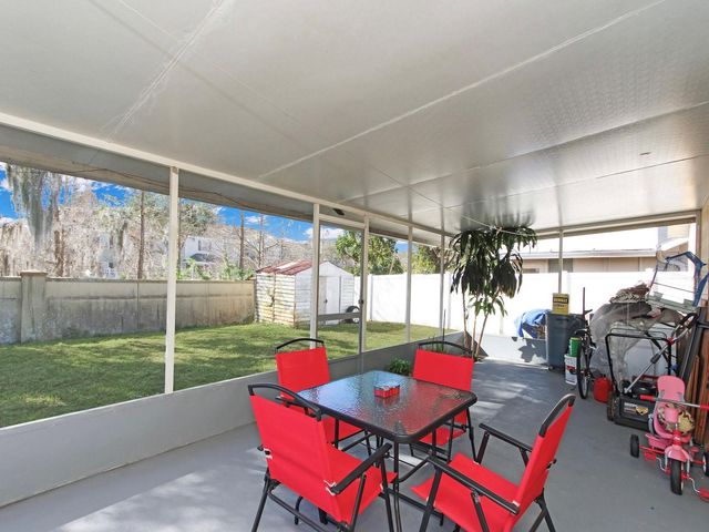 6936 NEEDLE POINT DRIVE, Orlando, FL 32822