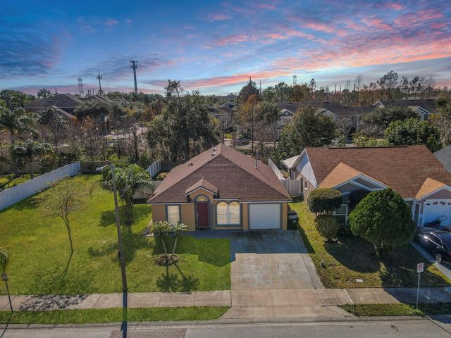 6936 NEEDLE POINT DRIVE, Orlando, FL 32822