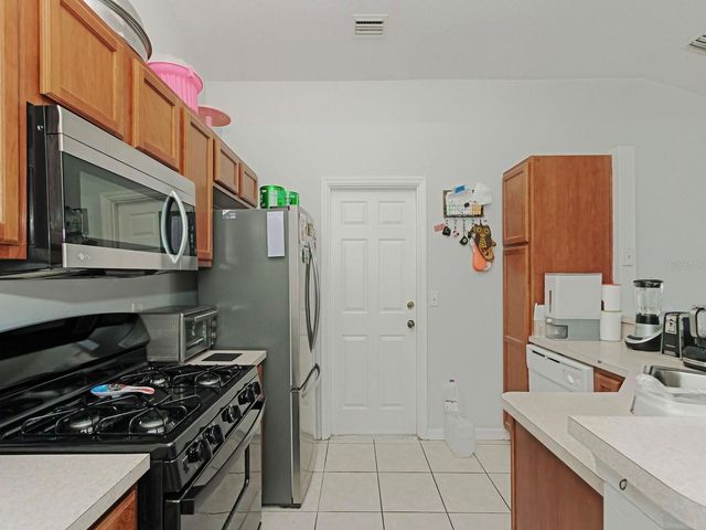 6936 NEEDLE POINT DRIVE, Orlando, FL 32822