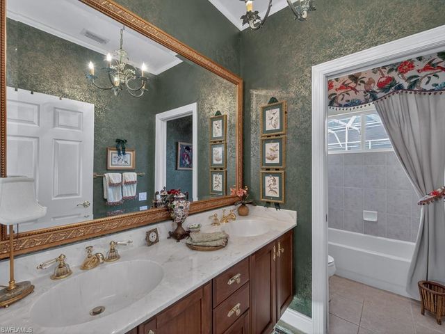 5875 Whisperwood CT, Naples, FL 34110