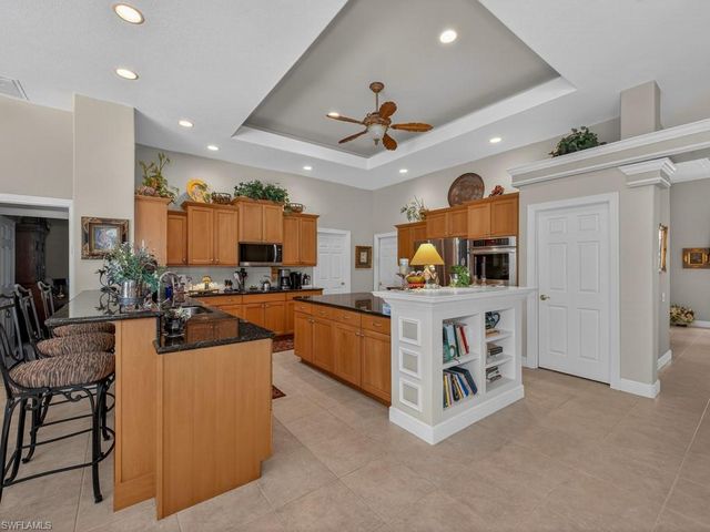 5875 Whisperwood CT, Naples, FL 34110