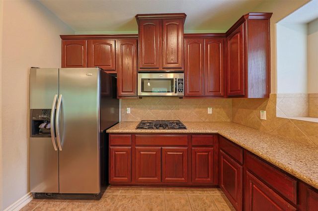 403 Woodpecker Forest Lane, Conroe, TX 77384