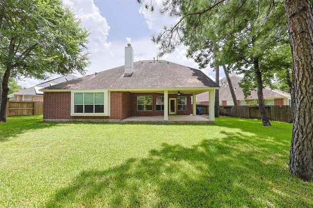 403 Woodpecker Forest Lane, Conroe, TX 77384