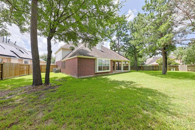 403 Woodpecker Forest Lane, Conroe, TX 77384